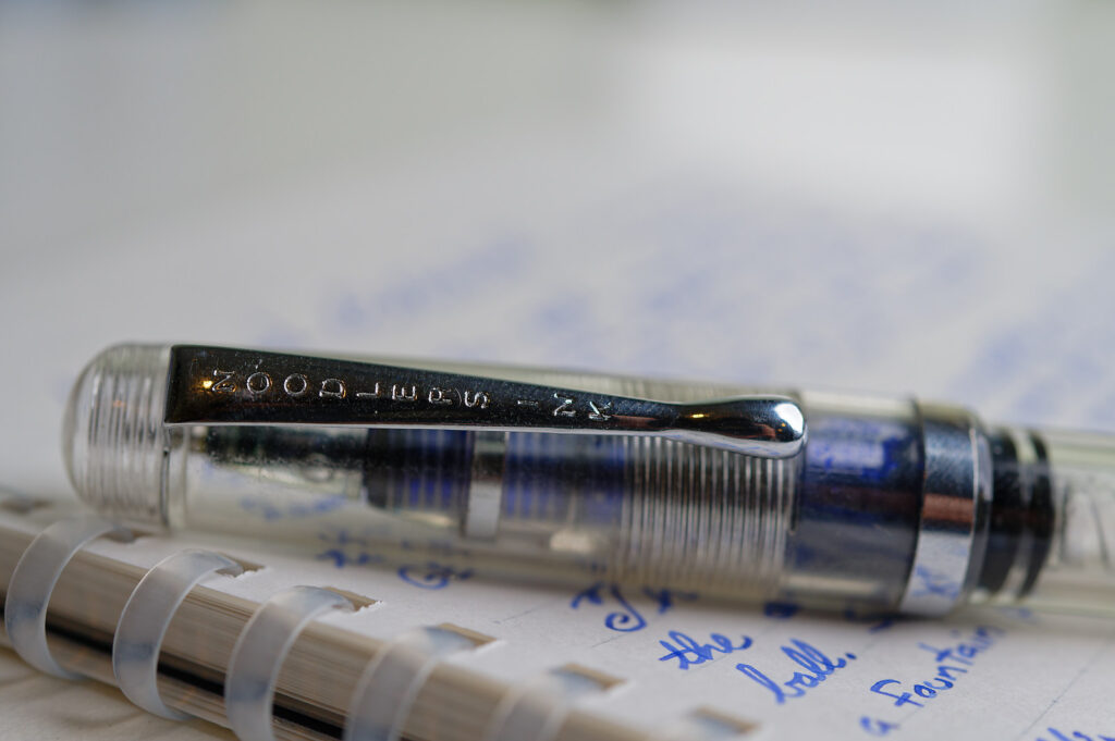 The cap and clip of a Noodler's Konrad Rollerball pen.